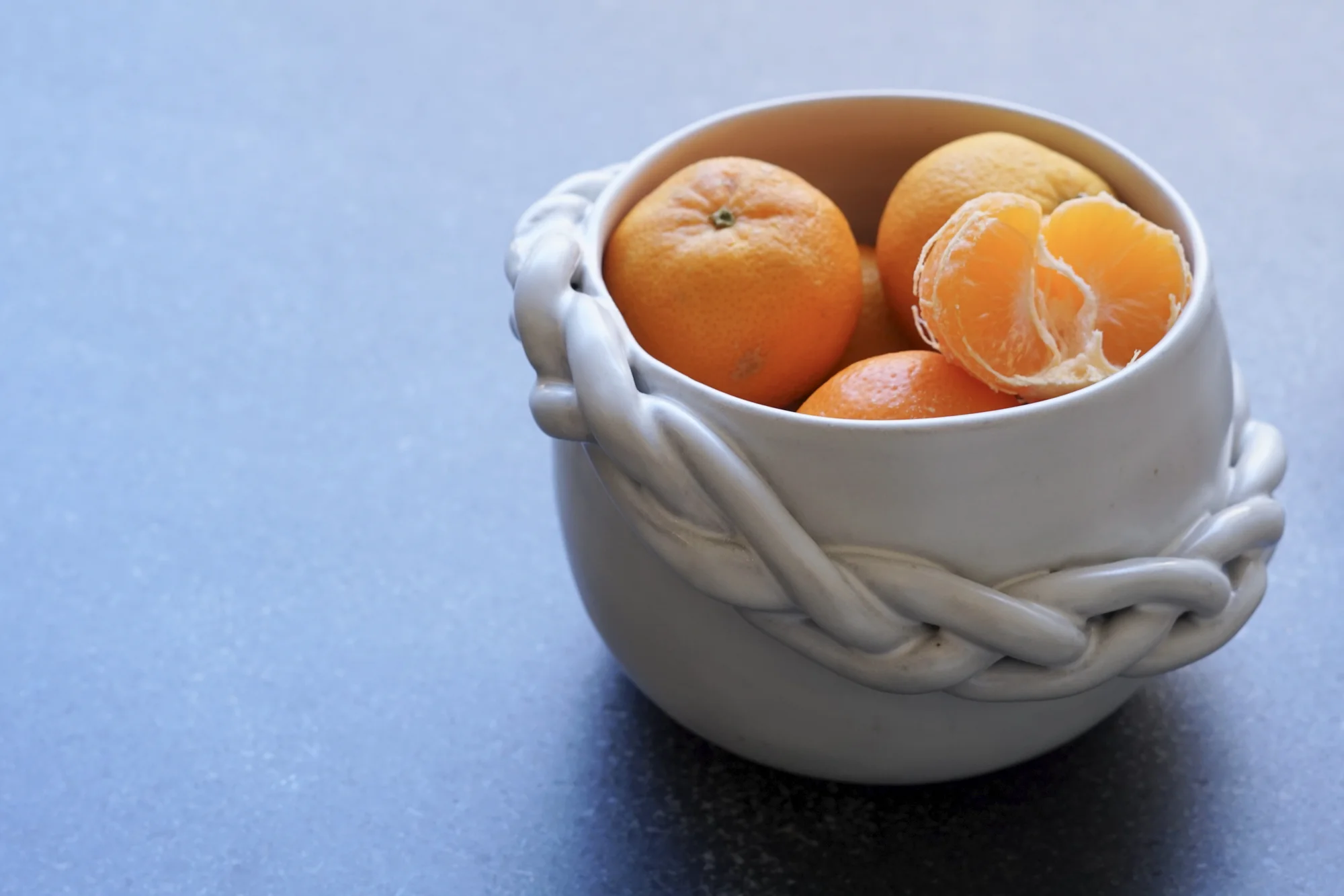 A quiet still-life of ceramic pieces in use at home
